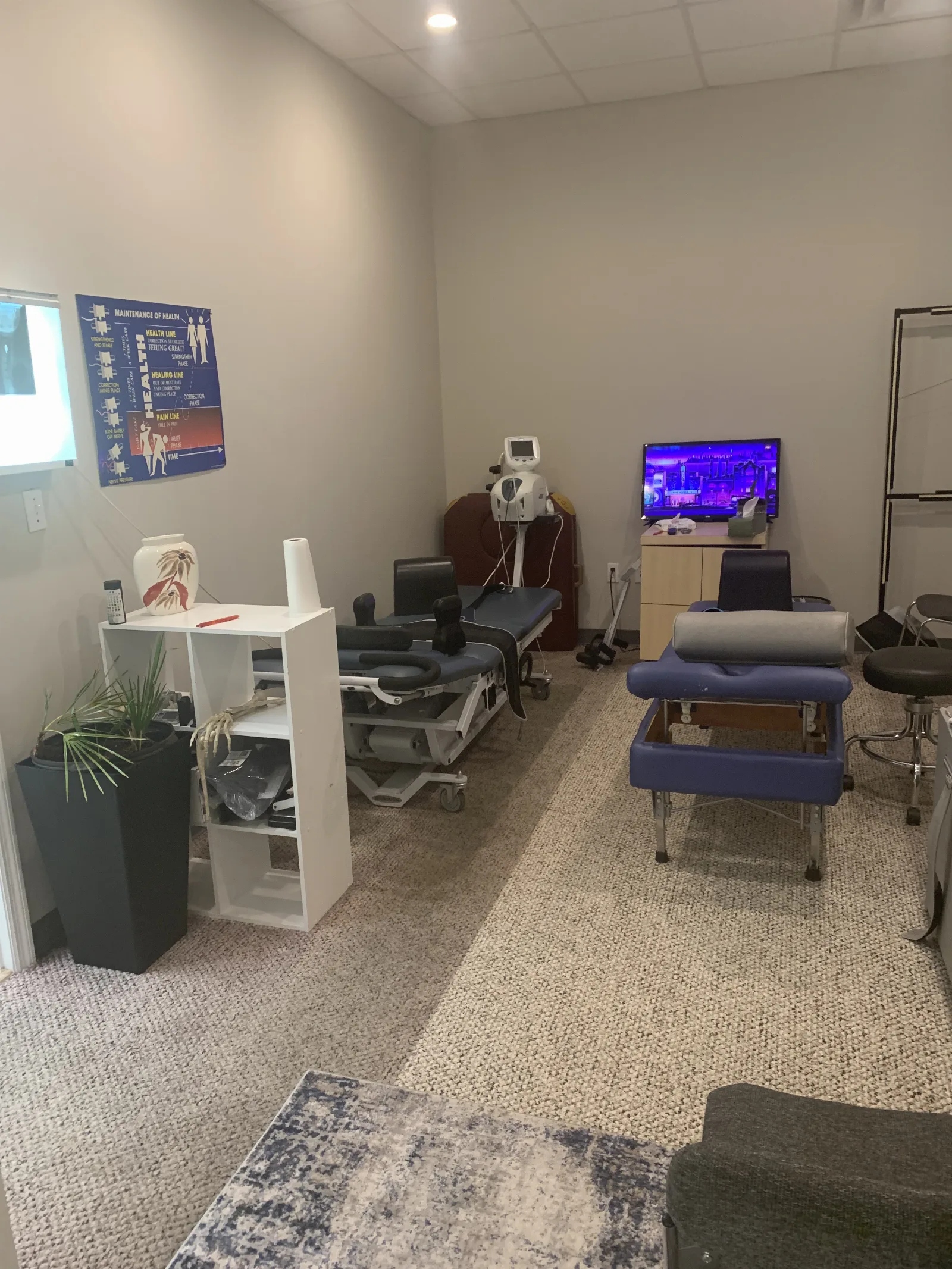 Adjustment room with chiropractic tables
