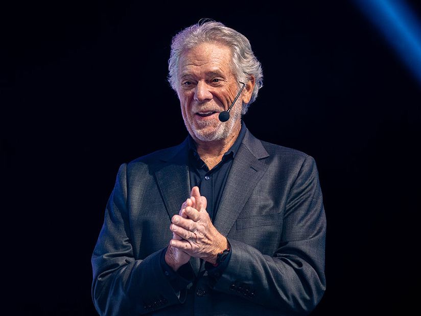 Keith Cunningham speaking on stage