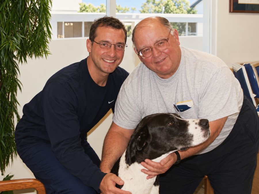M. Lee Baldwin and Dr. Marc Ferrin with Angel, the rescued Great Dane